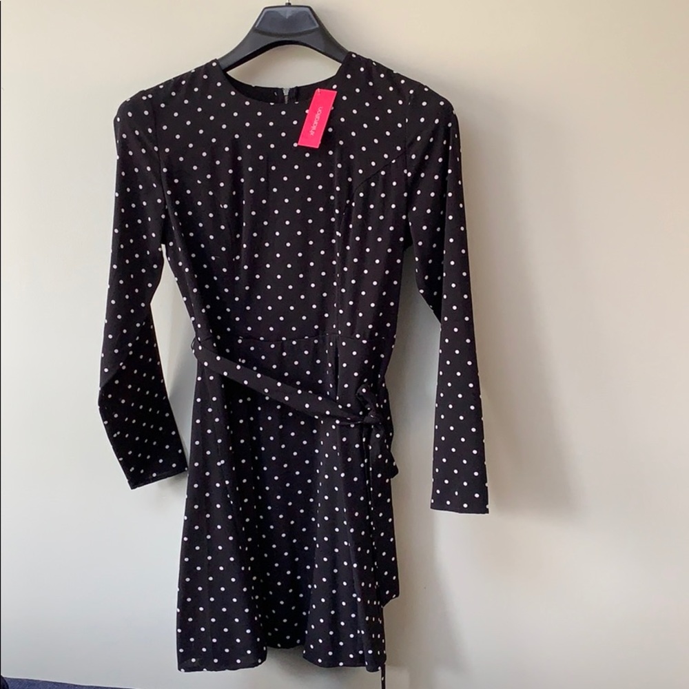 Knee-length polka dot dress